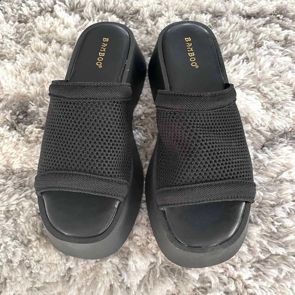 Black platform sandals. These can honestly fit size 8 feet too!